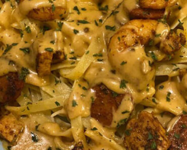 Cajun fettuccini Alfredo with shrimp, chicken, and spicy andouille sausage