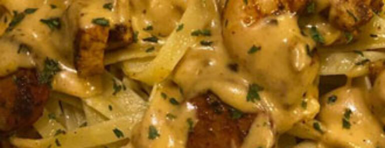 Cajun fettuccini Alfredo with shrimp, chicken, and spicy andouille sausage